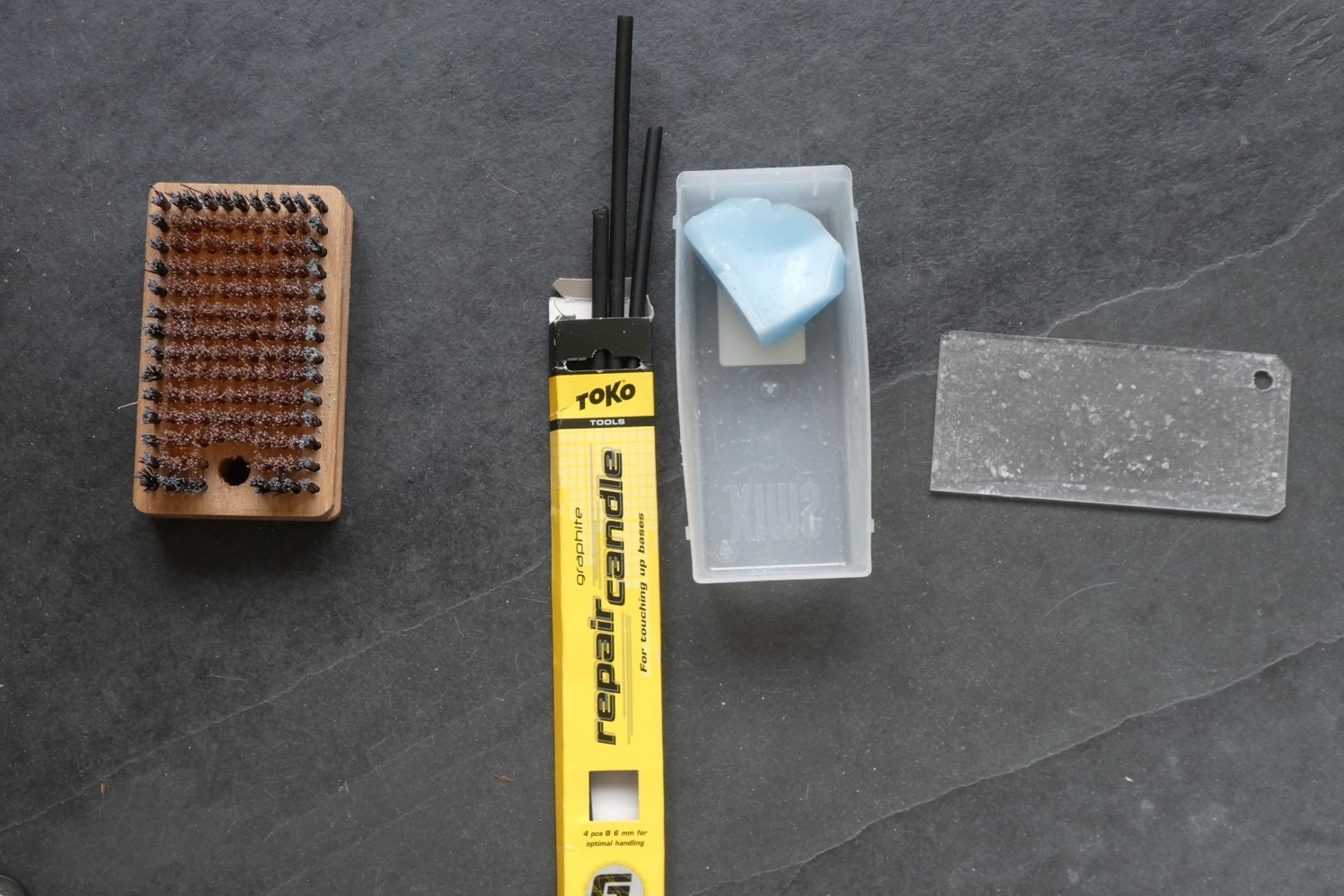 Toerski repareren en waxen-materialen